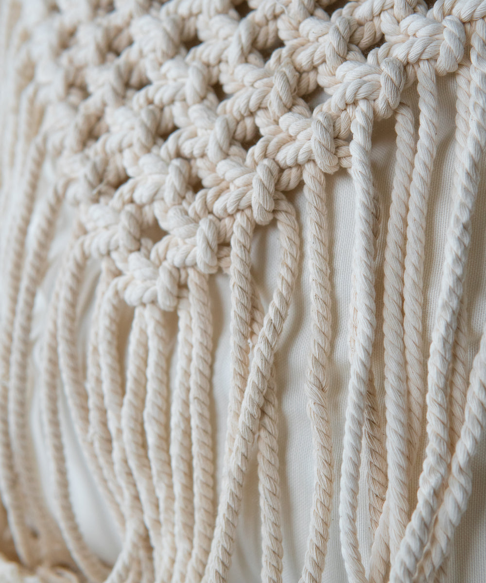 http://zenfoni.com/cdn/shop/files/bohopunchies-mamora-handmade-cotton-cream-fringed-braided-50x50-pillow-case-2_1200x1200.jpg?v=1702545579